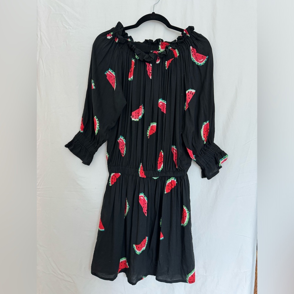 Super cute off the shoulder black dress, but could be worn as a longer shirt.
